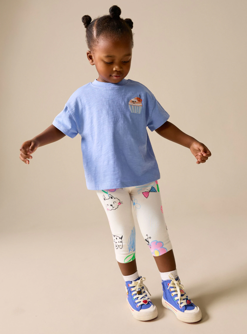 Legging capri infantil blanco con dibujos