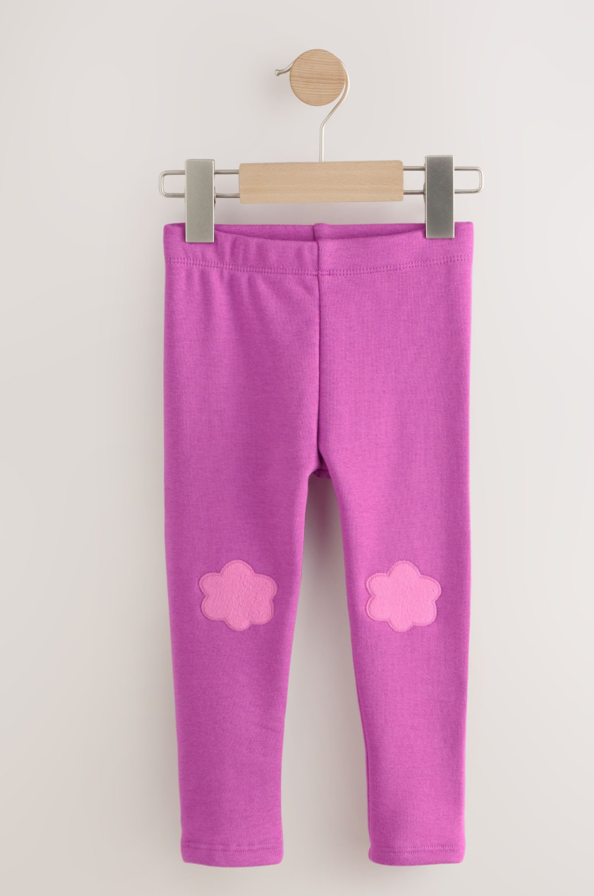 Legging infantil fucsia con flores