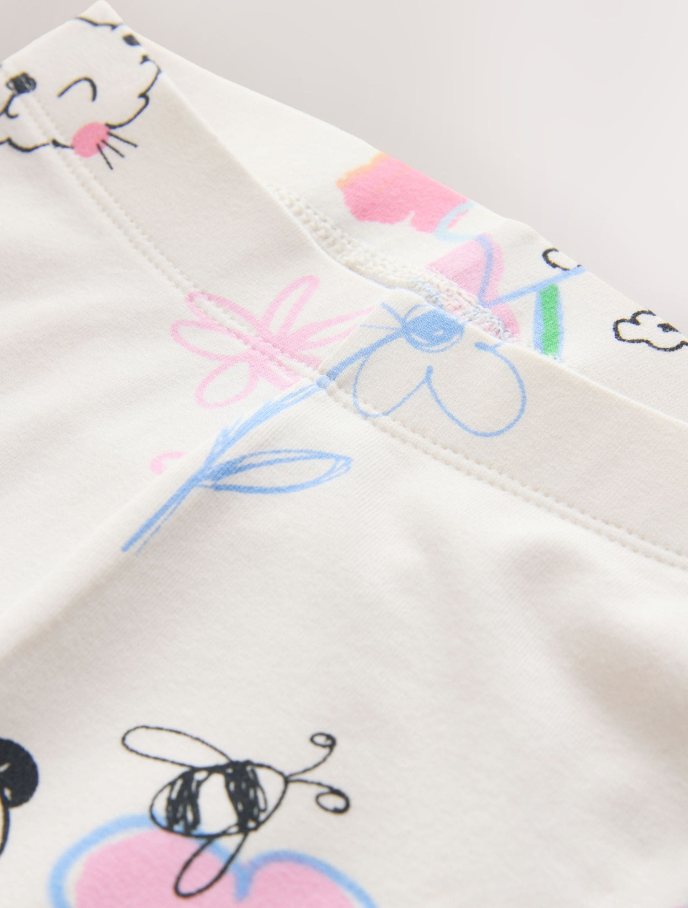 Legging capri infantil blanco con dibujos