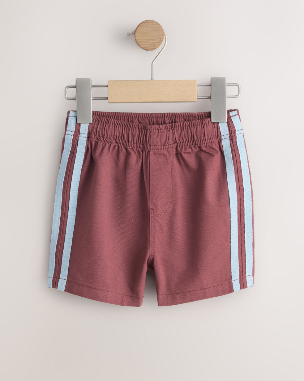 Short infantil con franjas laterales